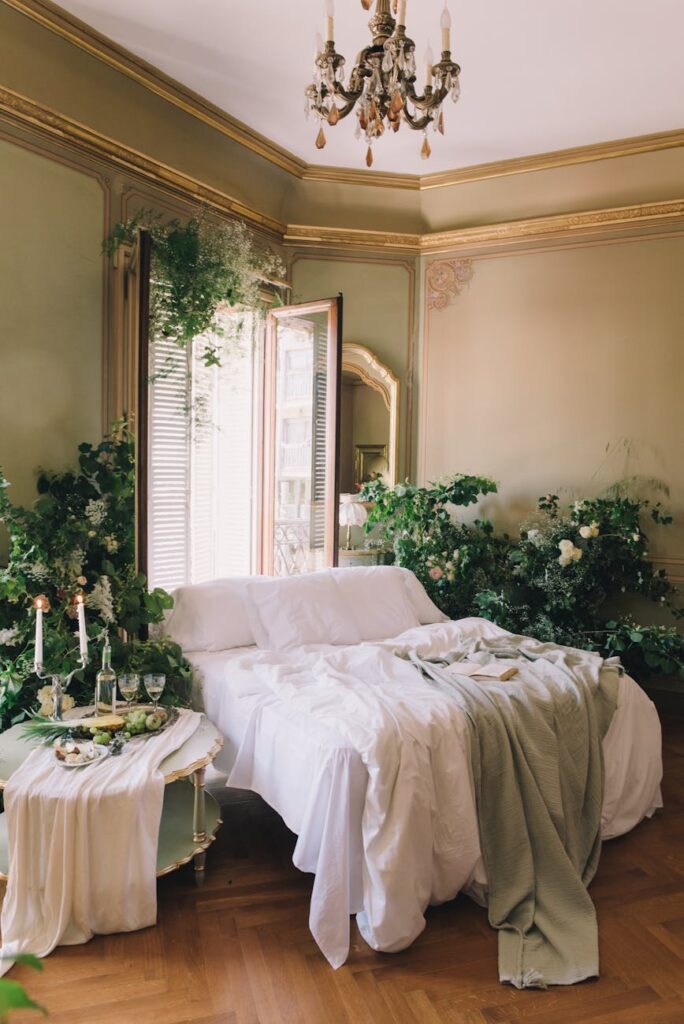 interior of a bedroom with lots of plants and decorated in a vintage luxurious style